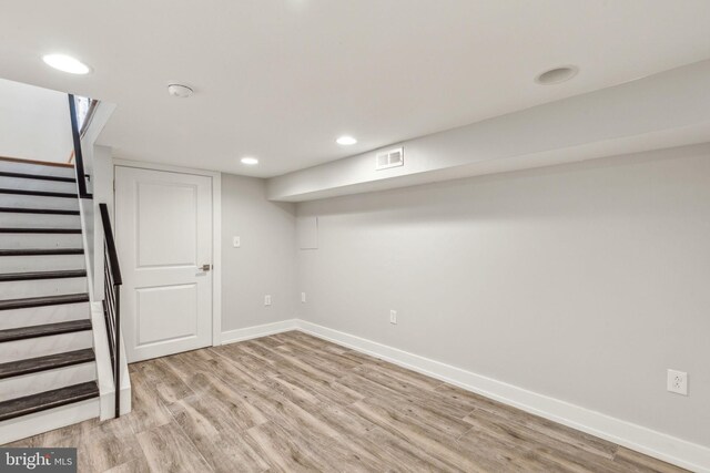 939 Sigel St, Philadelphia, PA 19148 - finished basement featuring light wood-style flooring, baseboards, stairway, and recessed lighting