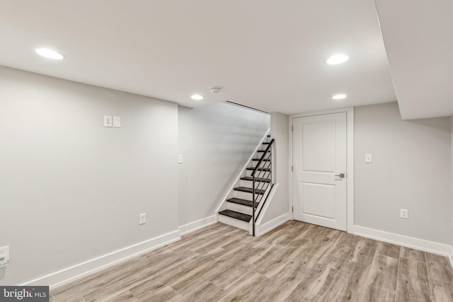 939 Sigel St, Philadelphia, PA 19148 - finished basement with light wood-type flooring, recessed lighting, baseboards, and stairway