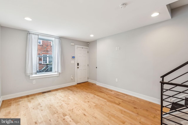 939 Sigel St, Philadelphia, PA 19148 - entryway with light wood-type flooring, baseboards, recessed lighting, and stairway