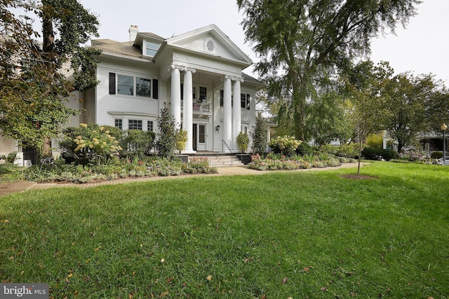 1801 Park Rd NW Unit 2, Washington, DC 20010 - greek revival inspired property featuring a front lawn and a chimney