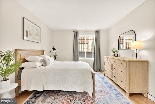 1801 Park Rd NW Unit 2, Washington, DC 20010 - bedroom featuring light wood-style floors and baseboards