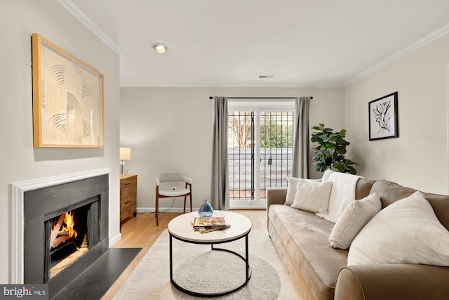 1801 Park Rd NW Unit 2, Washington, DC 20010 - living room featuring light wood-style floors, ornamental molding, a fireplace with flush hearth, baseboards, and recessed lighting