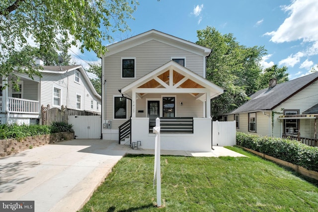 1427 Jackson St NE, Washington, DC 20017 - view of front facade featuring a gate, covered porch, and driveway