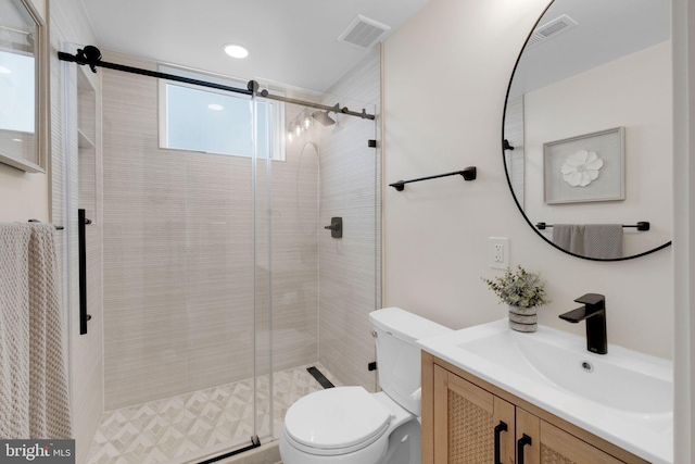 1427 Jackson St NE, Washington, DC 20017 - bathroom featuring vanity, toilet, and a shower stall