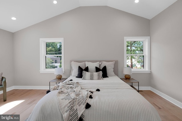 1427 Jackson St NE, Washington, DC 20017 - bedroom with multiple windows, light wood-type flooring, recessed lighting, vaulted ceiling, and baseboards