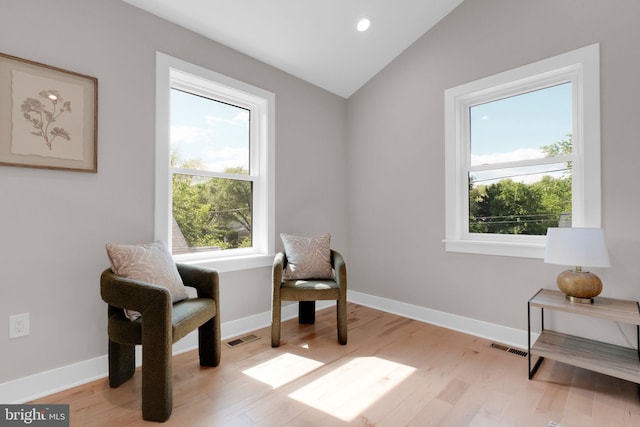 1427 Jackson St NE, Washington, DC 20017 - living area featuring plenty of natural light, lofted ceiling, light wood-style floors, baseboards, and recessed lighting