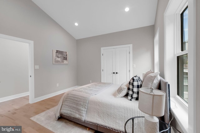 1427 Jackson St NE, Washington, DC 20017 - bedroom featuring light wood-style flooring, baseboards, recessed lighting, high vaulted ceiling, and a closet