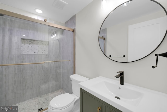 1427 Jackson St NE, Washington, DC 20017 - bathroom featuring toilet, vanity, and a shower stall