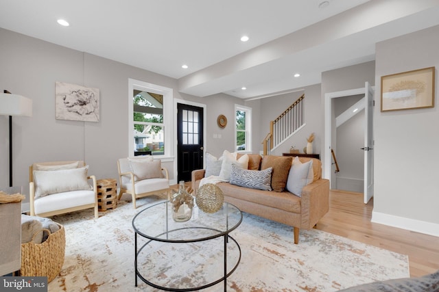 1427 Jackson St NE, Washington, DC 20017 - living area featuring wood finished floors, stairs, recessed lighting, and baseboards