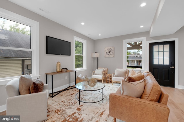 1427 Jackson St NE, Washington, DC 20017 - living area with healthy amount of natural light, recessed lighting, wood finished floors, and baseboards