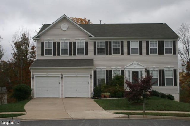 22 Thaxton Ct, Stafford, VA 22556 - view of front of house featuring a garage, driveway, and a front lawn