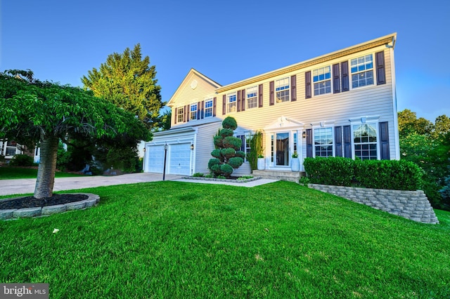 22 Thaxton Ct, Stafford, VA 22556 - view of front of house with a garage, a front lawn, and driveway