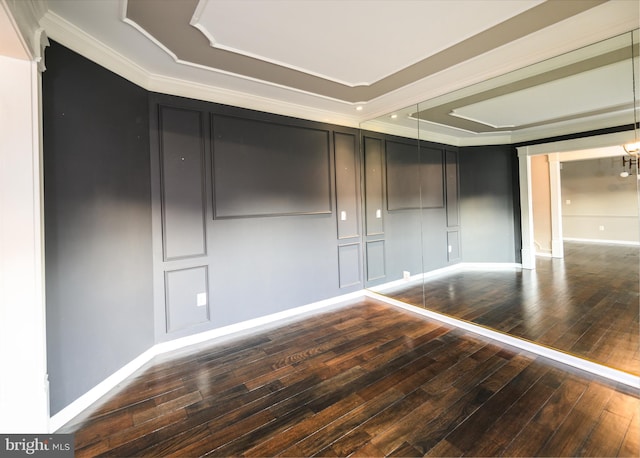 22 Thaxton Ct, Stafford, VA 22556 - unfurnished room with hardwood / wood-style flooring, crown molding, a raised ceiling, baseboards, and a chandelier