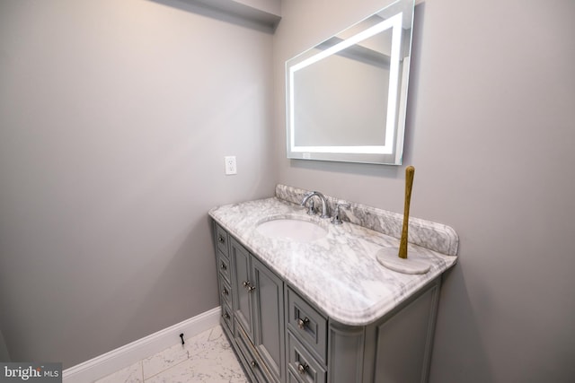 22 Thaxton Ct, Stafford, VA 22556 - bathroom with marble look tile flooring, baseboards, and vanity