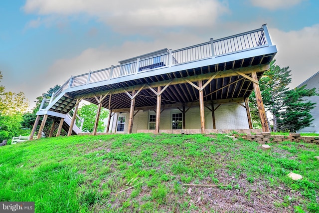 22 Thaxton Ct, Stafford, VA 22556 - back of property with a deck, brick siding, and stairway