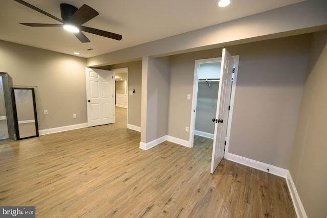 22 Thaxton Ct, Stafford, VA 22556 - basement with light wood finished floors, a ceiling fan, recessed lighting, and baseboards