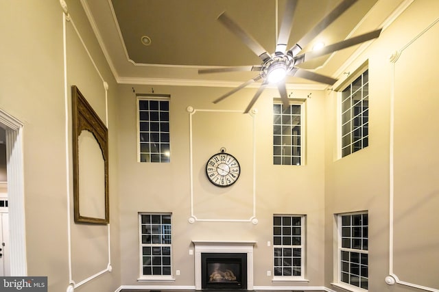 22 Thaxton Ct, Stafford, VA 22556 - detailed view of ceiling fan, ornamental molding, and a glass covered fireplace