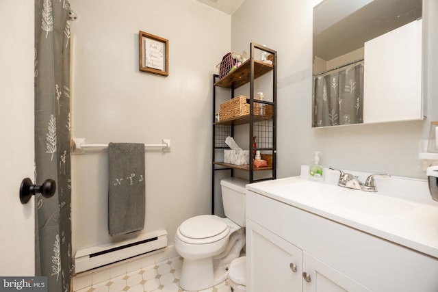 100 Winding Way Unit A-23, Downingtown, PA 19335 - bathroom with a baseboard heating unit, toilet, and vanity