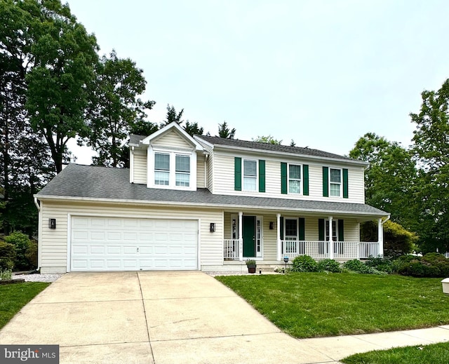 1301 Saran Ct, Odenton, MD 21113 - view of front of house featuring covered porch, driveway, and a front lawn