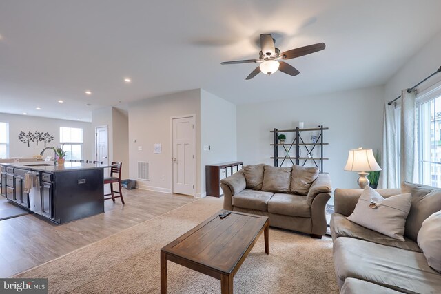 1032 Rosecroft Ln Unit 15, York, PA 17403 - living room featuring a ceiling fan, light colored carpet, recessed lighting, and baseboards
