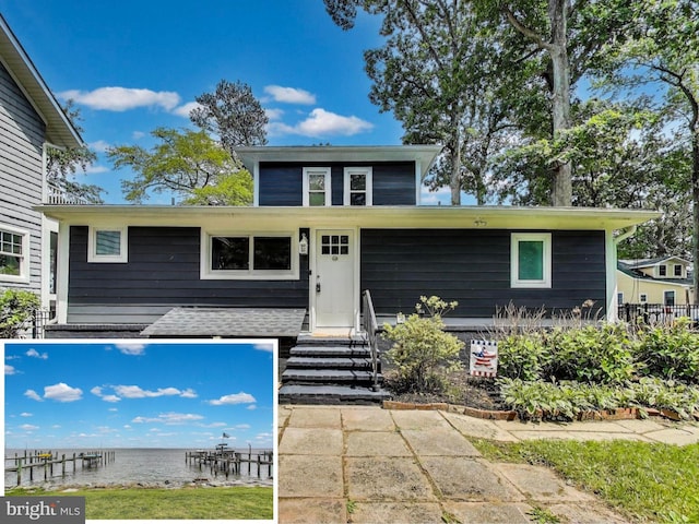 966 Walnut Ave, North Beach, MD 20714 - view of front of home featuring a water view