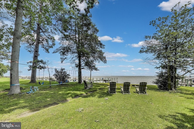 966 Walnut Ave, North Beach, MD 20714 - view of green lawn featuring a water view