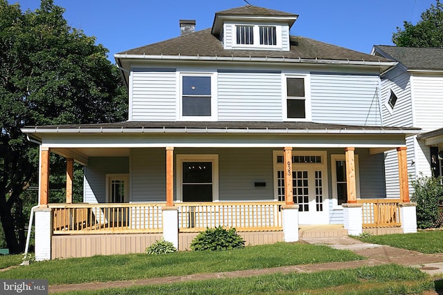 933 Mccormick Blvd, Clifton Forge, VA 24422 - american foursquare style home featuring covered porch, a chimney, and roof with shingles