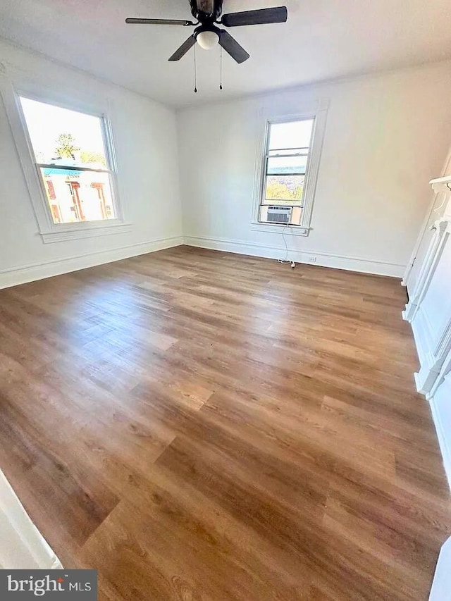 933 Mccormick Blvd, Clifton Forge, VA 24422 - empty room featuring ceiling fan, wood finished floors, and baseboards