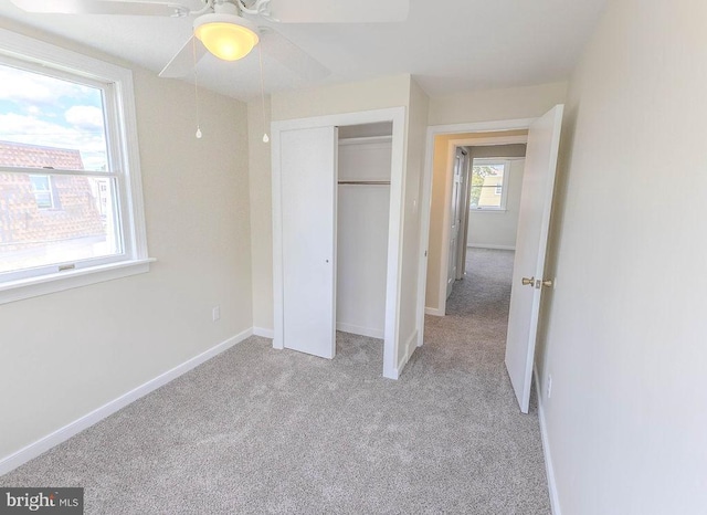 4128 Whiting Rd, Philadelphia, PA 19154 - unfurnished bedroom featuring light colored carpet, a closet, baseboards, and a ceiling fan