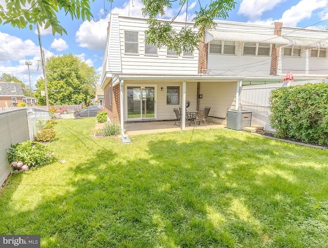 4128 Whiting Rd, Philadelphia, PA 19154 - rear view of house with central AC and a patio