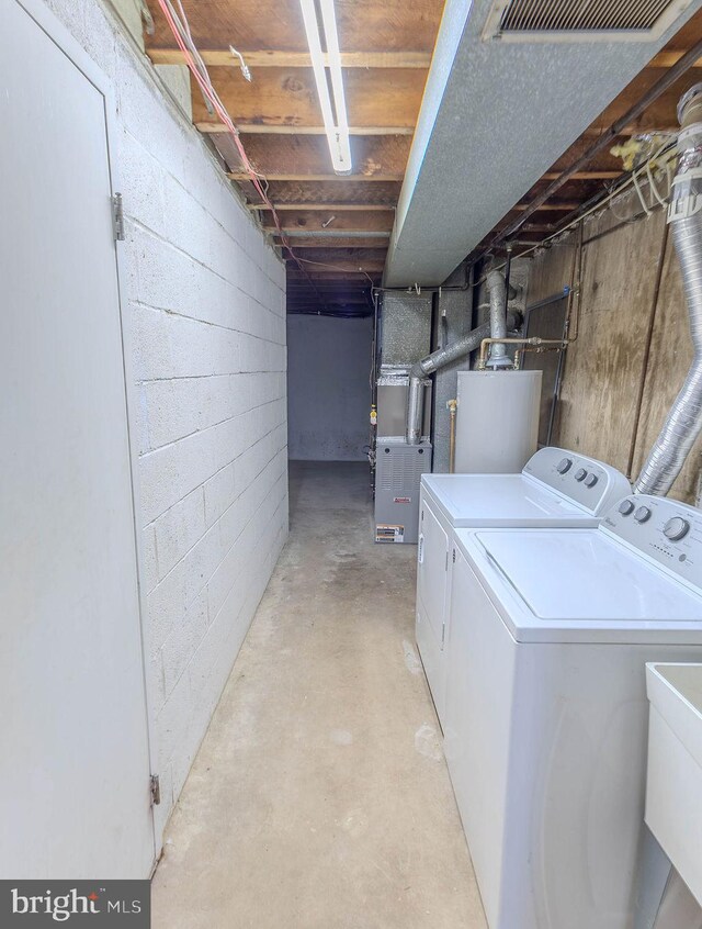 4128 Whiting Rd, Philadelphia, PA 19154 - laundry room with washer and clothes dryer, gas water heater, and heating unit