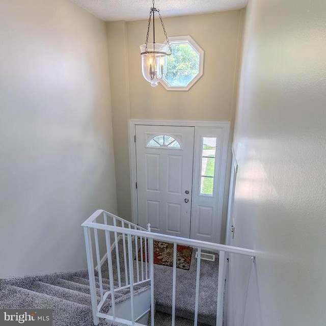 4128 Whiting Rd, Philadelphia, PA 19154 - foyer with a chandelier and stairway