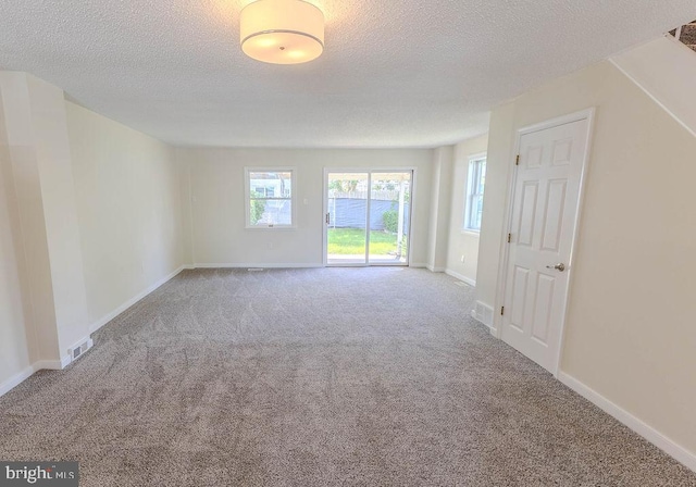 4128 Whiting Rd, Philadelphia, PA 19154 - carpeted empty room featuring a textured ceiling and baseboards