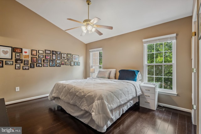 7140 Ladd Cir, Frederick, MD 21703 - bedroom with multiple windows, baseboards, dark wood-style floors, lofted ceiling, and a ceiling fan