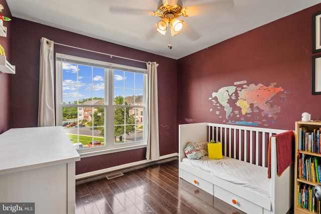 7140 Ladd Cir, Frederick, MD 21703 - bedroom with wood finished floors, baseboards, and a ceiling fan