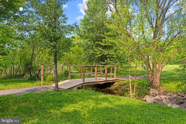 7140 Ladd Cir, Frederick, MD 21703 - view of property's community with a yard and a wooden deck