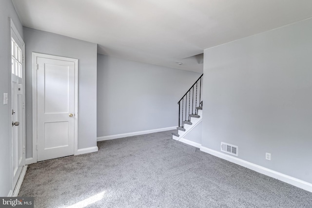 151 Bennett Rd, Essex, MD 21221 - carpeted spare room featuring baseboards and stairway