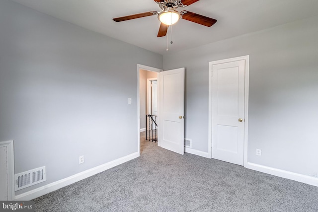 151 Bennett Rd, Essex, MD 21221 - unfurnished bedroom with carpet flooring, baseboards, and a ceiling fan