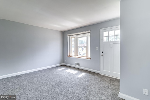151 Bennett Rd, Essex, MD 21221 - carpeted foyer entrance with baseboards