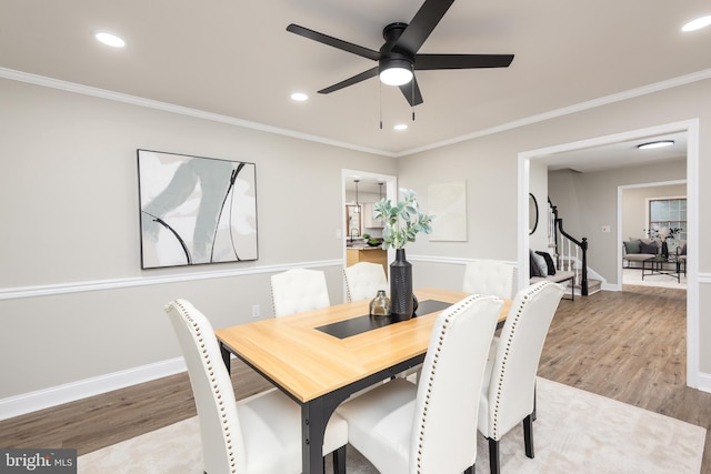 81 Rivers End Dr, Seaford, DE 19973 - dining space featuring wood finished floors, stairs, a ceiling fan, recessed lighting, and baseboards