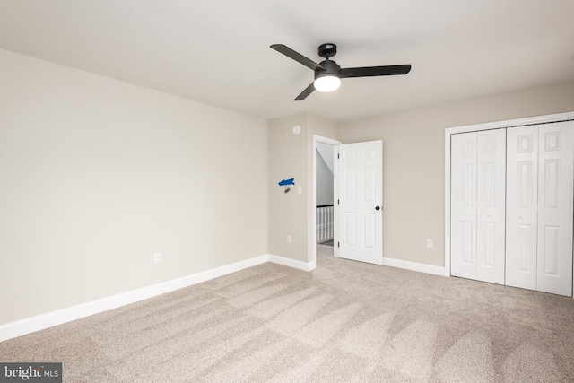81 Rivers End Dr, Seaford, DE 19973 - unfurnished bedroom featuring carpet flooring, baseboards, a closet, and a ceiling fan