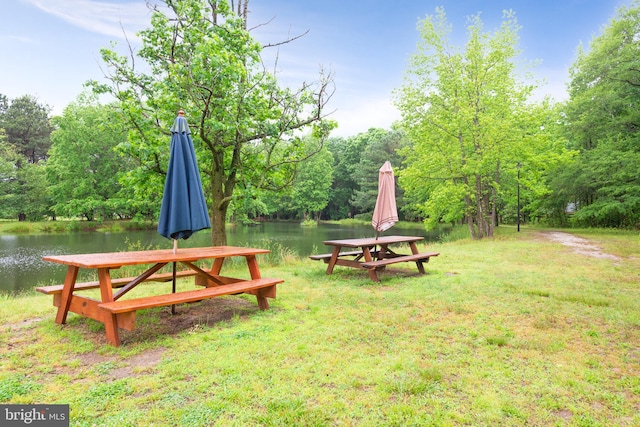 81 Rivers End Dr, Seaford, DE 19973 - surrounding community featuring a lawn and a water view