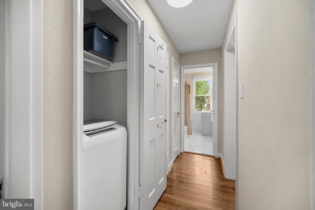 117 E Glebe Rd Unit C, Alexandria, VA 22305 - laundry room featuring washer / dryer, wood finished floors, and baseboards
