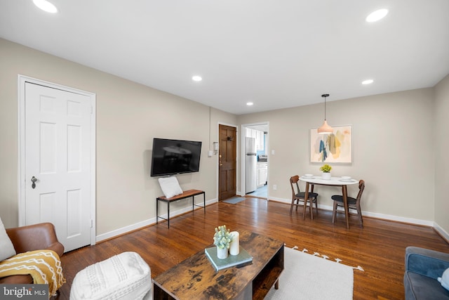 117 E Glebe Rd Unit C, Alexandria, VA 22305 - living area with wood finished floors, baseboards, and recessed lighting
