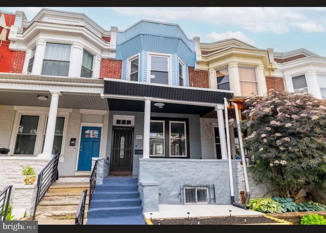 4605 N 13th St, Philadelphia, PA 19140 - view of property with brick siding and covered porch