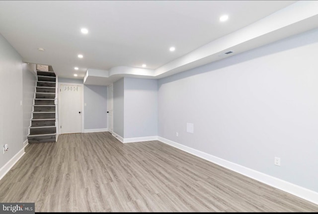 4605 N 13th St, Philadelphia, PA 19140 - finished below grade area with wood finished floors, baseboards, recessed lighting, and stairs