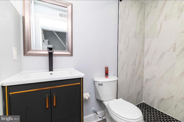 4605 N 13th St, Philadelphia, PA 19140 - bathroom with vanity, toilet, and a tile shower
