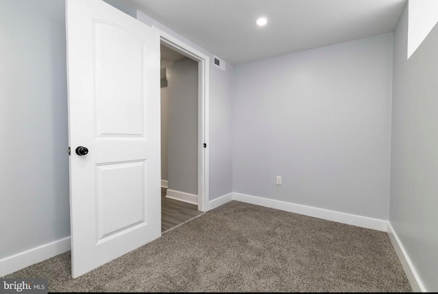 4605 N 13th St, Philadelphia, PA 19140 - unfurnished bedroom with dark colored carpet, baseboards, and recessed lighting