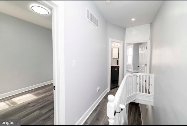4605 N 13th St, Philadelphia, PA 19140 - hallway featuring wood finished floors, baseboards, recessed lighting, and an upstairs landing