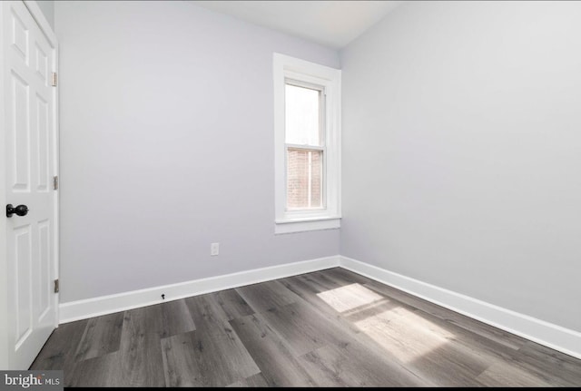 4605 N 13th St, Philadelphia, PA 19140 - empty room with dark wood-style flooring and baseboards